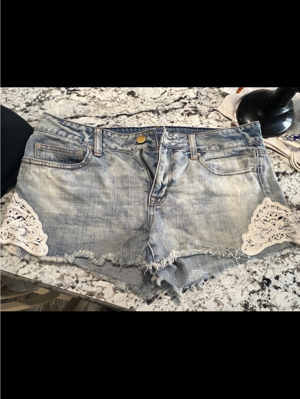 American Eagle Outfitters Light Blue Denim Shorts with White Crochet Accents